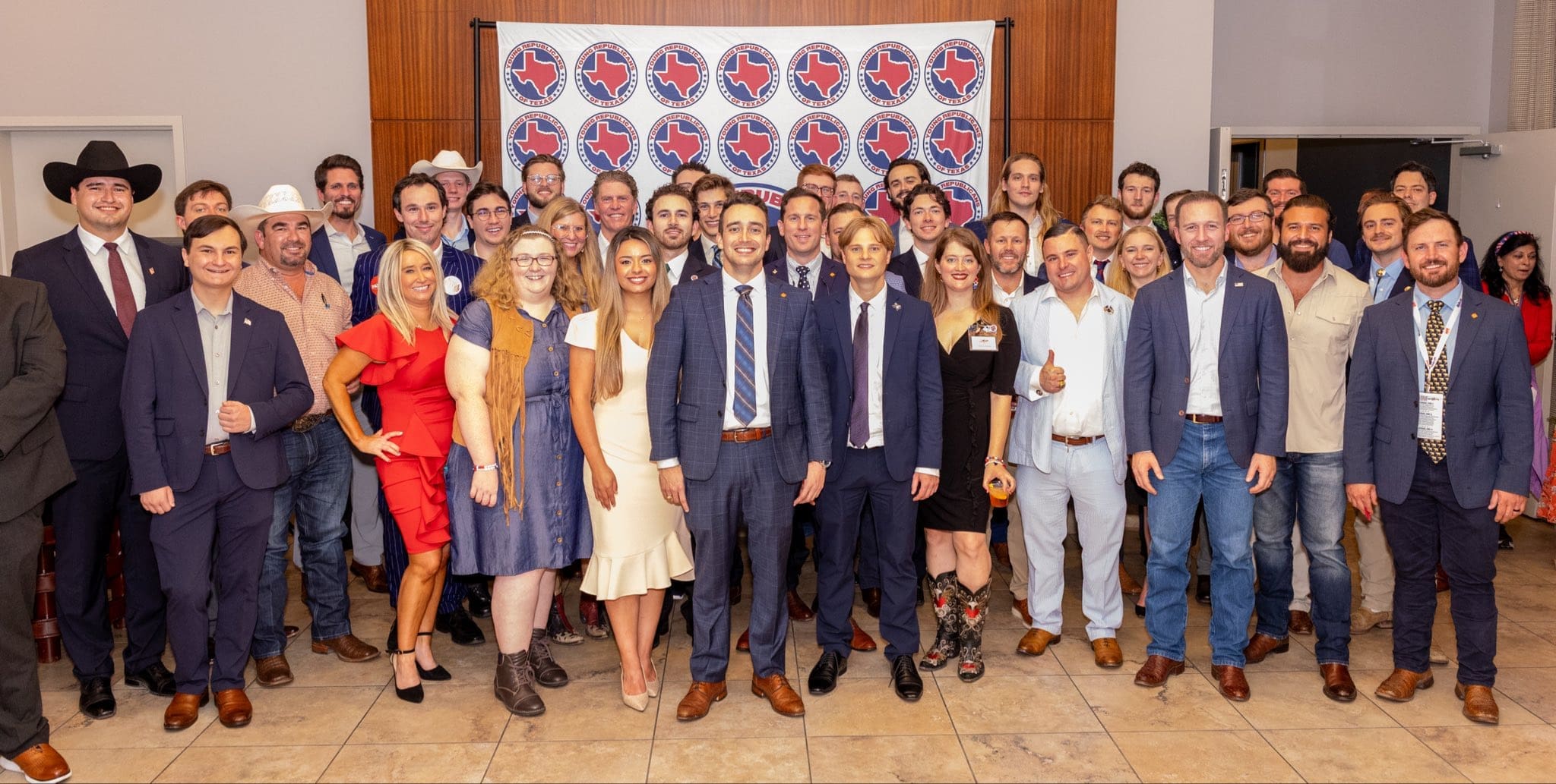 Members of the Young Republicans of Texas gather for a group photo at the Patriot Hour